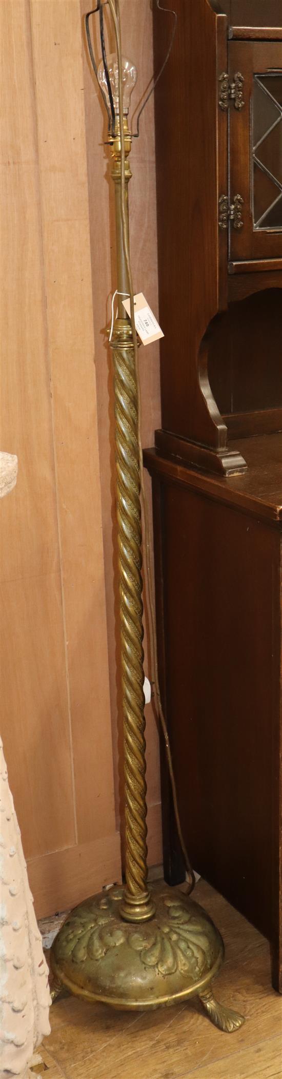An embossed brass telescopic lamp standard H.157cm